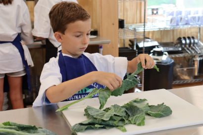 A boy cooking