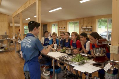 A boy giving instructions on a recipie