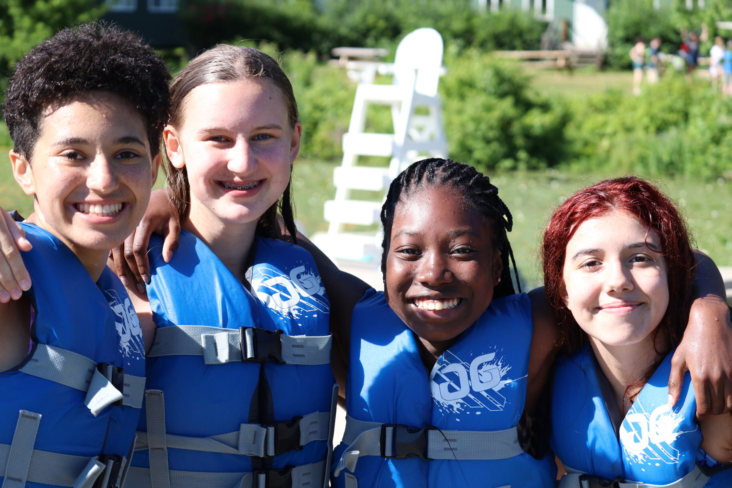 girls in life vests