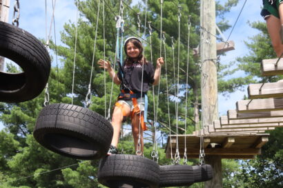 kid on a outdoor climbing gym