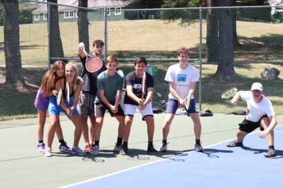 Teens on a tennis court